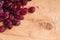 Diet healthy food. Border of dried cranberries on wooden background