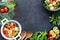 Diet, proper nutrition, grilled vegetables and with ingredients on a dark background. Frame. Vegetarian food. Top view. Copy space