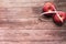Diet red apple bind with measuring tape on the wooden backgrounds health and fitness life concept