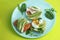 Diet toasts with cheese, salad, avocado, tomato and eggs. Healthy organic food