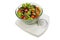 Diet. Vegetables salad in a bowl with weight scale, isolated on