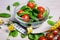 Diet and weight loss concept - salad with spinach and tomatoes a