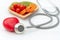 Diet and weight loss for healthy care with medical stethoscope, vegetable fruit and healthy food