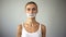 Diet word written on taped mouth of anorexic model, severe diet, health problems