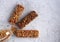 dietary cereal fitness bars with granola on a gray background