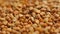 Dietary food from buckwheat seeds, kept on a kitchen table in a heap