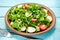 Dietary food green salad with tomatoes, cucumber and quail eggs