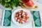 Dietary salad from fresh watermelon, blue onion and goat cheese