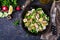 Dietary salad with mussels, quail eggs, cucumbers, radish and lettuce.