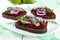 Dietary sandwiches with herring, boiled beets, red onion on rye bread