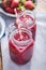 Dieting and well being concept, berry smoothie in jar