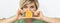 Dietitian holding slice of orange