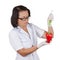 Dietitian Scientist Female Doctor Holding Red Paprika Being Injected with Syringe