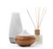 Different aroma oil diffusers on white background.