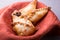 Different baked pirogi or samosa