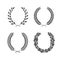 Different black and white silhouette circular wreaths depicting an award, achievement, heraldry, nobility