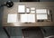 Different branding mockup elements. Template set on wood table