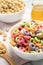 Different breakfast cereals on fabric, closeup