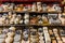 Different cheeses on the counter of a small store at the Aligre