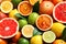 Different citrus fruits as background