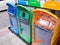 Different Colored Bins For Collection Of Recycle Materials with waste icon.