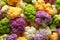 Different colorful cauliflowers, closeup