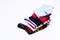 Different colorful socks in one stack for kids or woman. Fashion warm clothes for feet