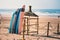 Different colors of surf on a the sandy beach in Casablanca - Morocco. Beautiful view on sandy beach and ocean. Surf boards for re