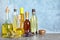Different cooking oils in bottles on table