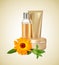 Different cosmetic products with calendula extract on beige