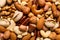 Different delicious nuts as background, closeup