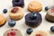 Different delicious vegan candies on white table, closeup