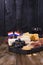 Different Dutch cheese. Ham, grapes, olives and snacks. Free space for text. copy space