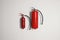 Different fire extinguishers hanging on wall