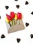 Different flowers , tulips and chrysanthemums with chocolates in the shape of a heart