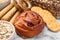 Different gluten free products on white marble table, closeup