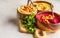 Different hummus bowls. Chickpea hummus, avocado hummus and beet