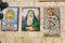 Different icon mosaics of Madonna and the Child in different cultural stylesin Nazareth, Israel.