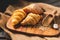 Different kinds of bread with nutrition whole grains on wooden background. Food and bakery in kitchen concept. Delicious breakfast