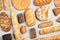 Different kinds of fresh bread on light background