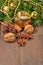 Different kinds of spices, nuts, cone and dried oranges, Christmas decorations and spruse branch