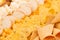 Different latin beer spicy crunchy snacks as background, closeup, pattern. Fast food backdrop.