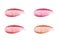 Different lip glosses isolated on white. Smudged lip gloss sample.