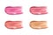 Different lip glosses isolated on white. Smudged lips gloss sample.