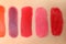 Different lipstick swatches on skin