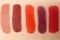 Different lipstick swatches on skin