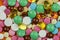 Different medical colorful pills background close up