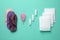Different menstrual hygiene products on turquoise background