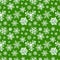 Different modern snowflakes on green background