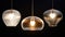 Different modern streamlined chandeliers. translucency, transparency and lighting